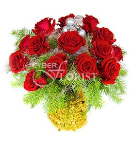 Winter charm. Magically elegant bouquet of red roses in winter decoration is a special surprise to the recipient for Christmas Holidays.